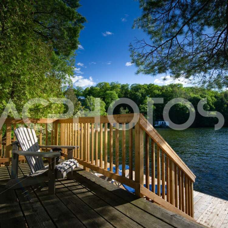 Adirondack chair on a cottage deck - Alessandro Cancian Photography