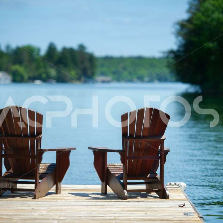 Adirondack chairs on a cottage dock - Alessandro Cancian Photography