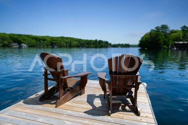 Adirondack chairs on a dock 2708
