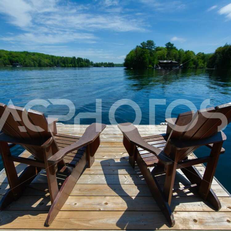 Close up of two Adirondack chairs - GettaPix