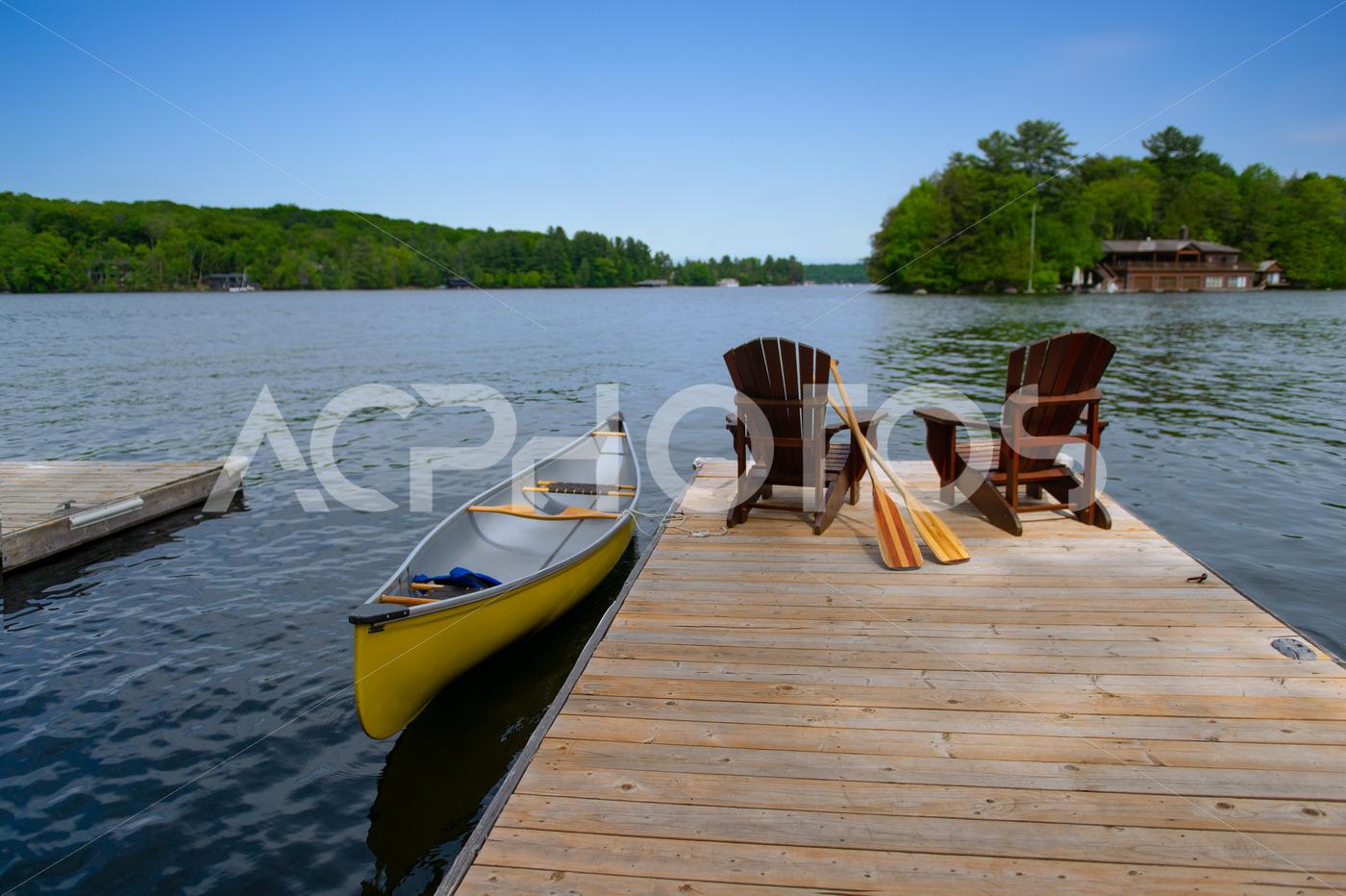 Cottage pier Adirondack chairs 038 canoe 2784