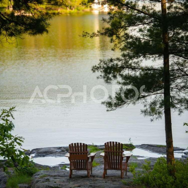 Muskoka Chairs near water - Get A Pix