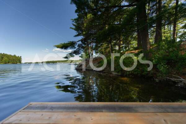 Wooden dock on a calm lake 2940