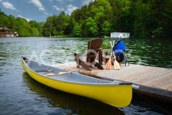 Yellow canoe with Adirondack chairs 2808