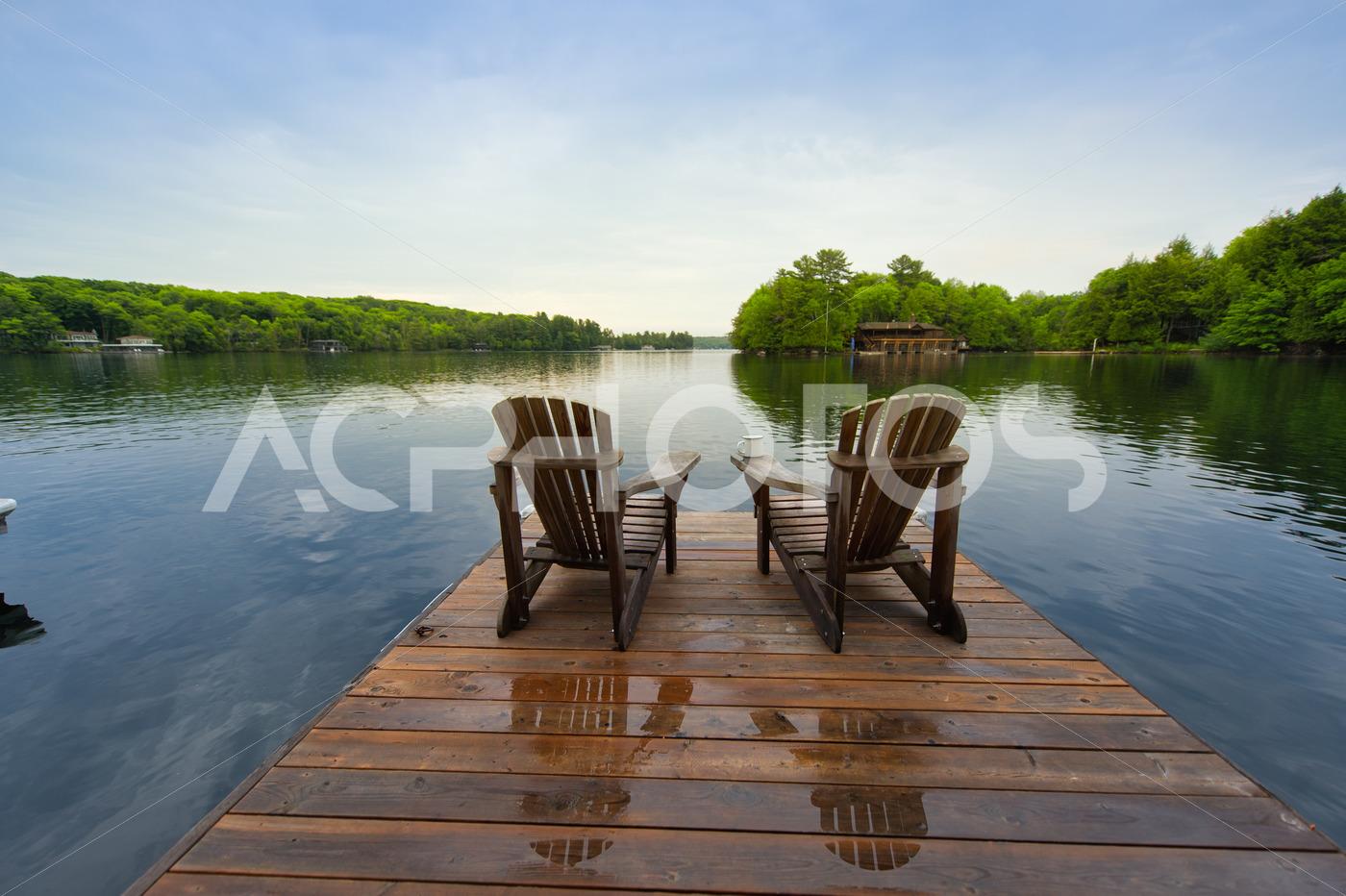 Muskoka chairs on a dock 3208