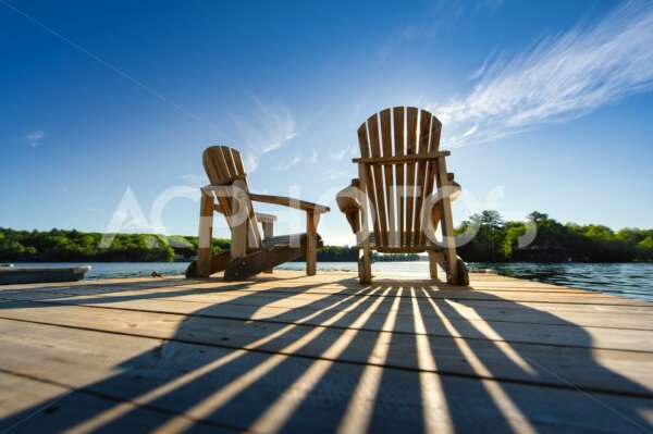 Sunlight Create Long Shadows on Adirondack Chairs 3358