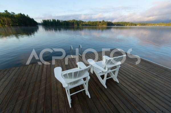 White Adirondack Chairs Facing Lake 3780