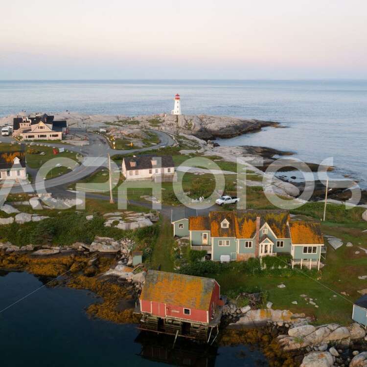 Aerial view of Peggy’s Cove at sunrise. - GettaPix
